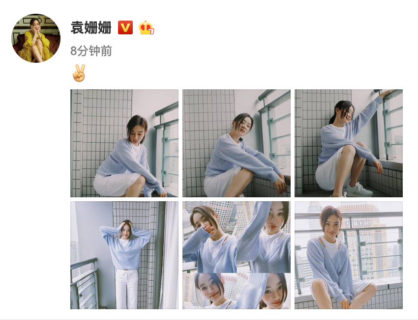 袁姗姗穿蓝色毛衣元气十足 倚靠阳台温柔恬静