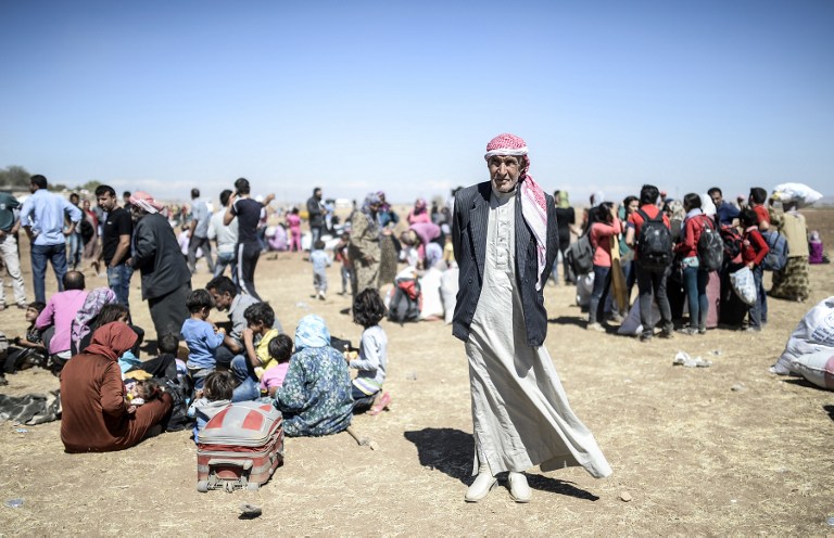 数万叙利亚库尔德人进入土耳其避难