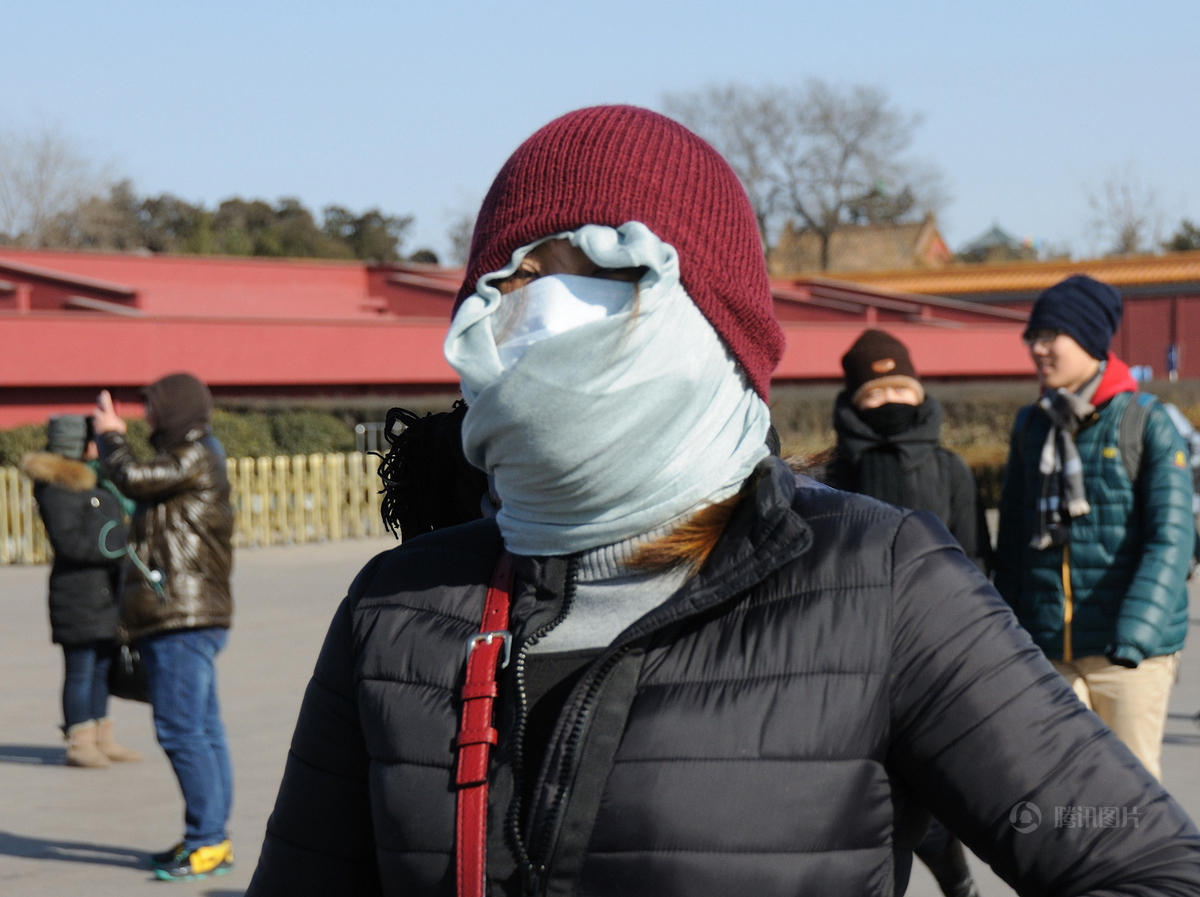 9 北京阵风8级最低-17℃ 市民出门裹成熊