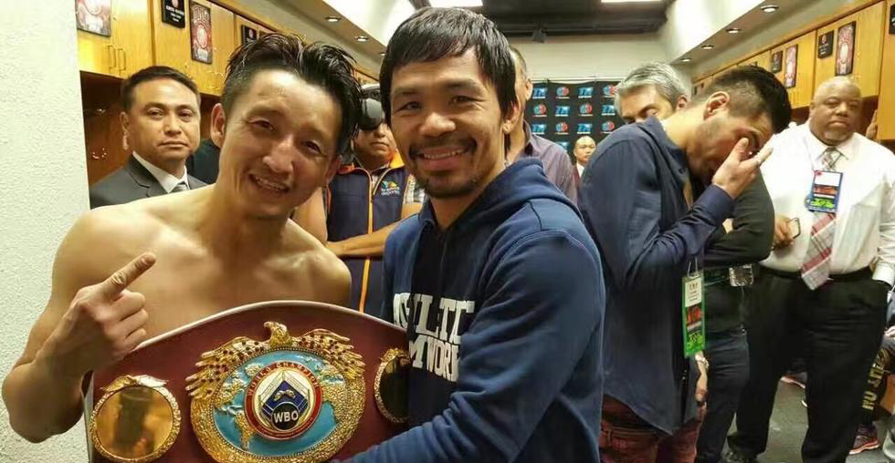 拳王帕奎奥向邹市明夺得金腰带表达祝贺   13/49 隐藏描述