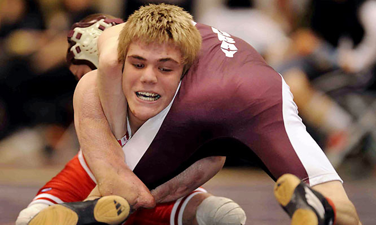 40 美国男孩因病切除四肢 靠摔跤赢得完美人生