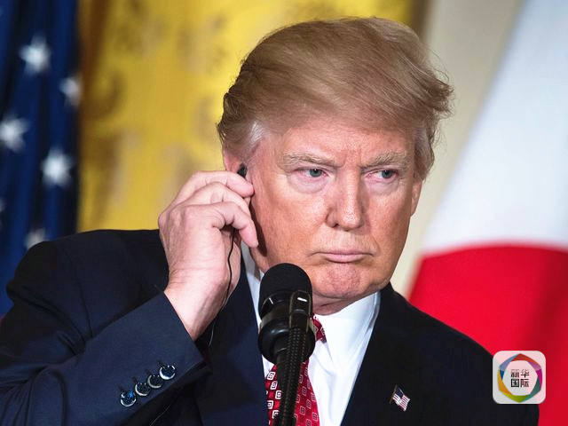 特朗普安倍会谈:耳机与握手成"热点"