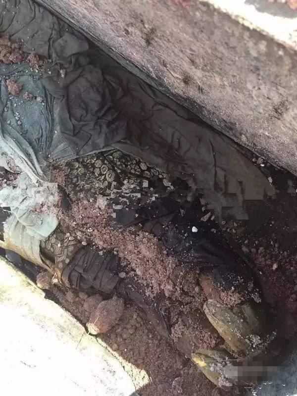 江西挖出明代古墓:棺内女尸完好 还流出清水