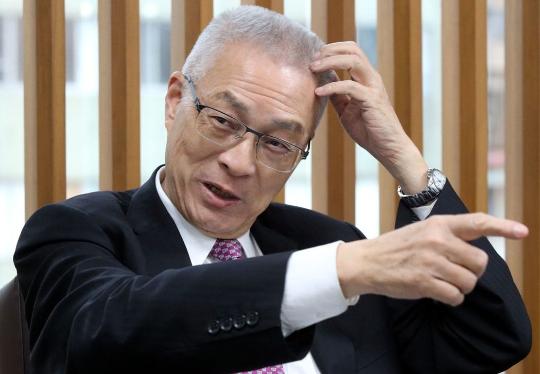 国民党被追讨8 6亿不当党产吴敦义 先还385亿债券