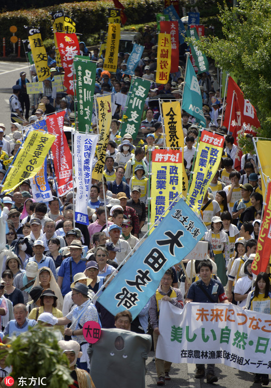 日本劳动节2万人游行要求首相安倍下台