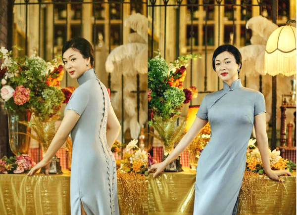 金星穿淡灰色紧身旗袍，凹各式造型，尽显S曲线，微微一笑，眼神魅惑，妥妥的性感女郎，太美了。