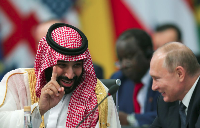 普京与沙特王储开心互动。(路透社)