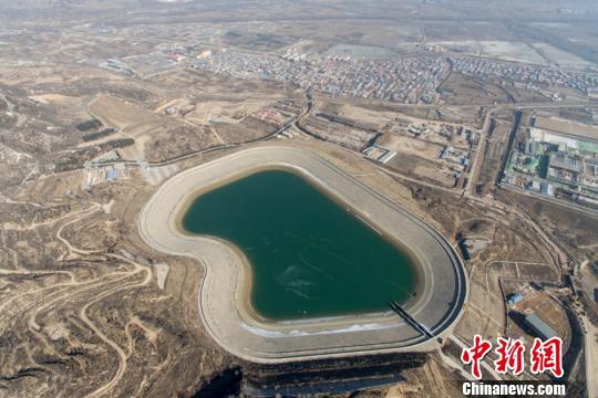 11日，山西省太原市尖草坪区一处水利设施发生渗漏。图为事发水库。 韦亮 摄