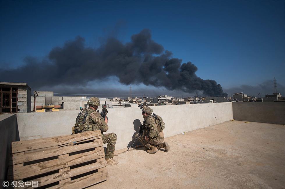 资料图：在伊拉克执行任务的美国军人(视觉中国)
