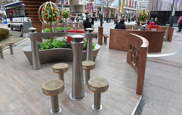 媒体评王府井闹市吸烟区披共享经济外衣挑战禁烟共识