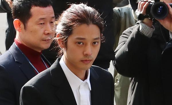 3月14日，郑俊英接受警方讯问。(韩联社)