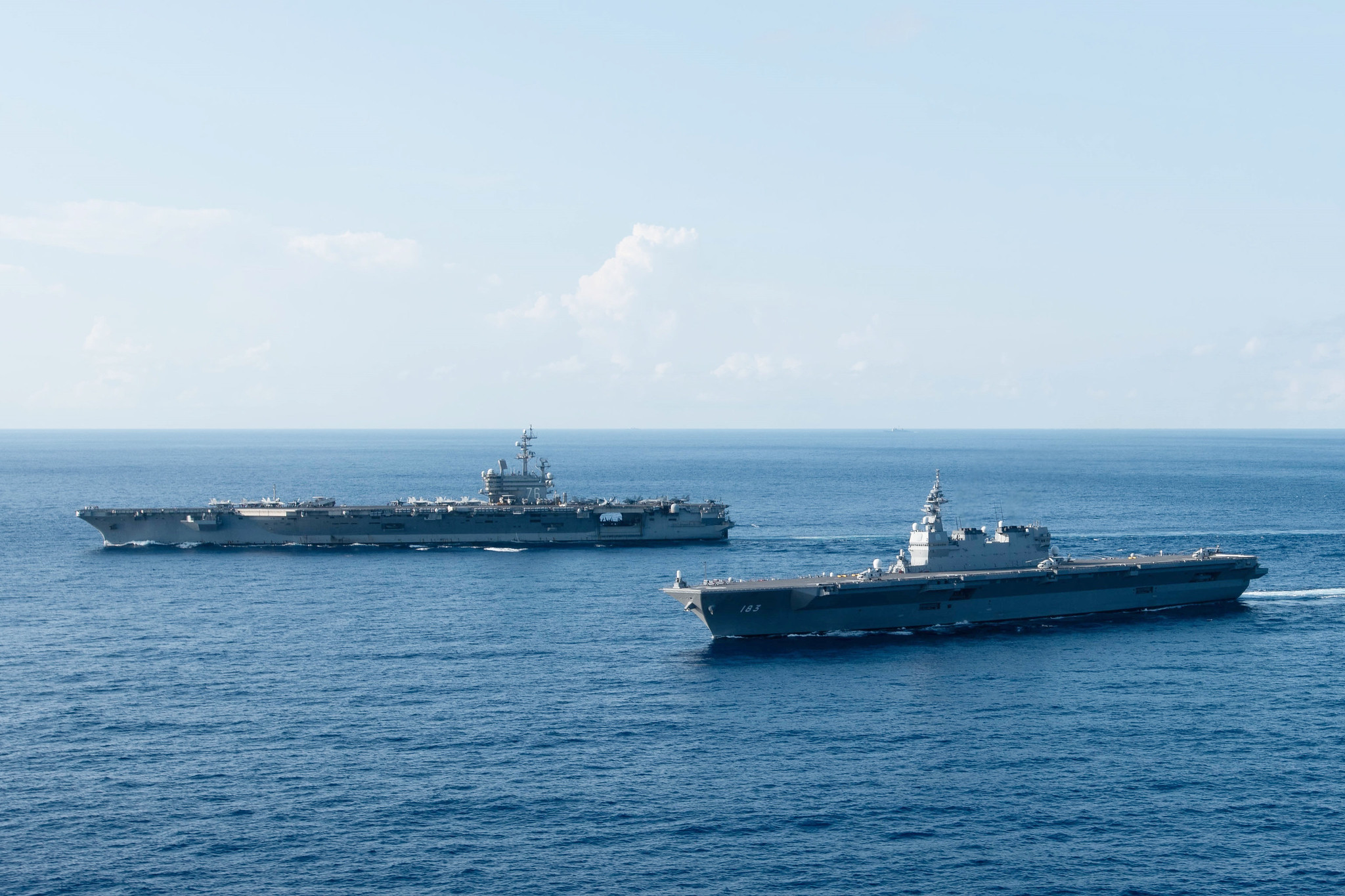 日本追随美国在南海军演无助于中日互信构建