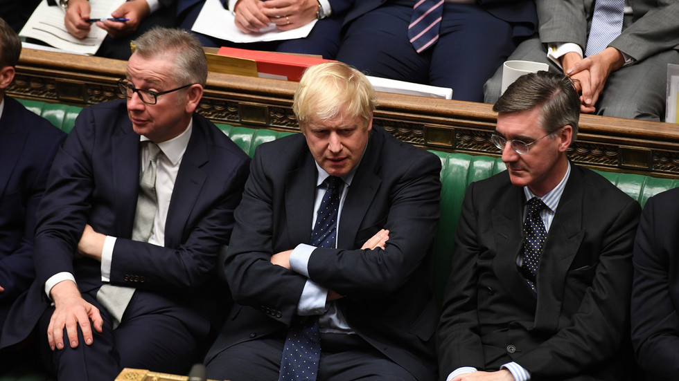 英国首相约翰逊在下议院。(图/路透社)
